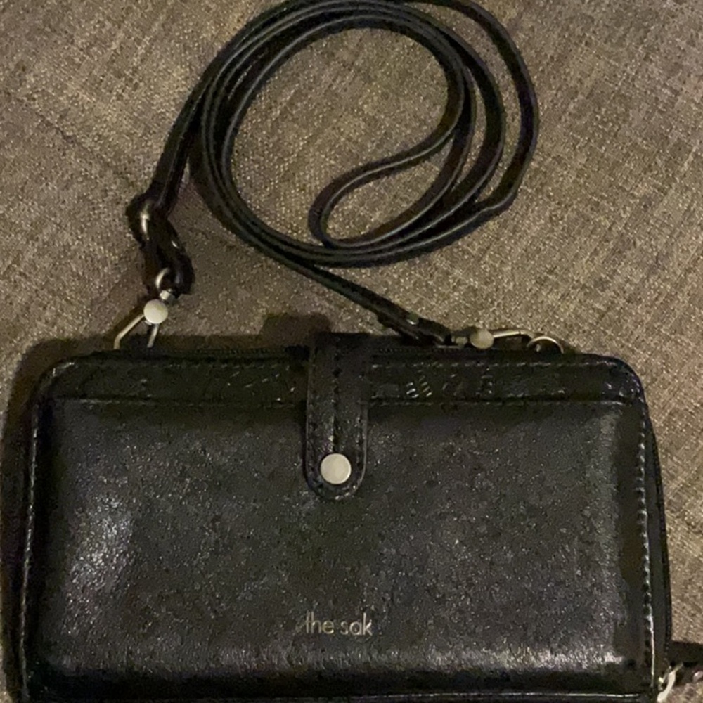 The Sak. Women’s black wallet/crossbody.  Like new
